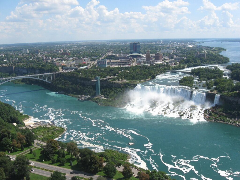 Aerial view from the Canadian side of the American Falls, the Rainbow Bridge and the city of Niagara Falls, New York