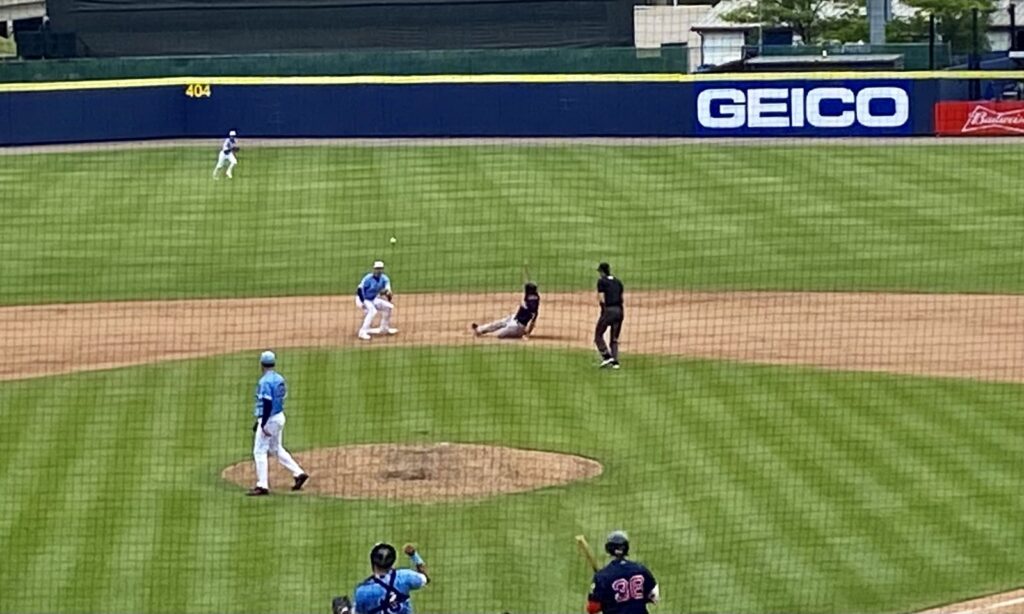 A Buffalo Bisons baseball game in progress at Sahlen Field, with a runner sliding into second base