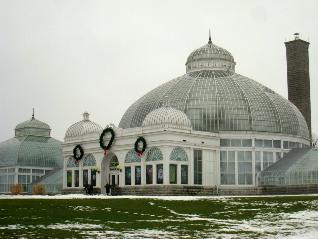 The white glass domes of the Buffalo and Erie County Botanical Gardens conservatory under a gray sky