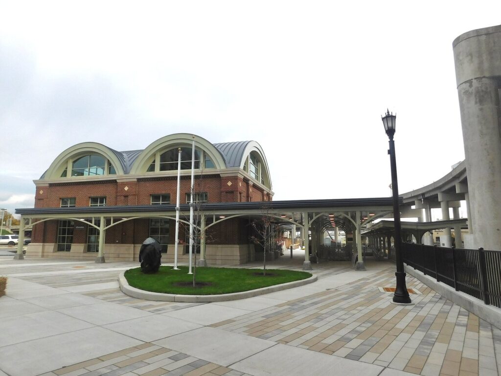The brick Amtrak station on Exchange Street in downtown Buffalo, with arched windows and a plaza in front