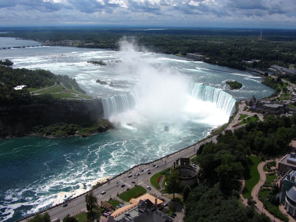 The Horseshoe Falls seen from above, with Goat Island on the left and the Niagara River rapids upstream