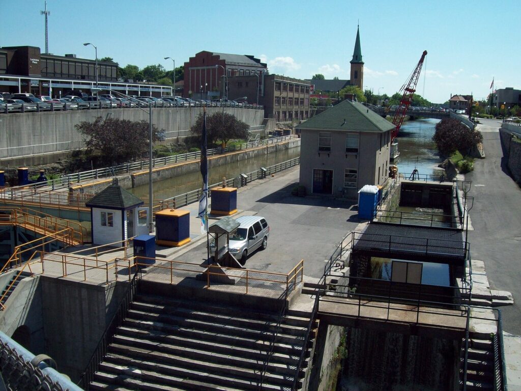 The Erie Canal locks at Lockport, with the stepped stone flight of old locks beside the modern lock chambers